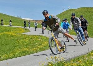 On foot and scooter in Adelboden