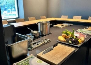 Cours de cuisine en équipe au restaurant à Bienne