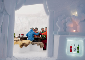 Snowshoeing for fondue in the igloo near Davos
