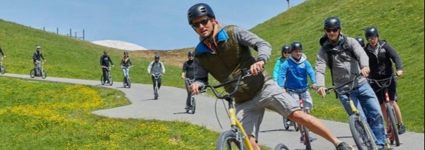 On foot and scooter in Adelboden