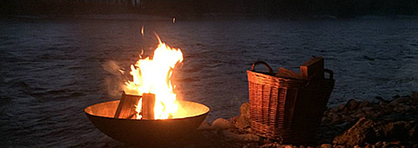 Fondue over the fire on the river Aare