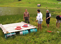 Raft building on a mountain lake